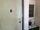Front door entry to condo with small potted plant at 6201 Green View Dr # 130, Sarasota, FL 34231