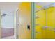 Bright yellow walk-in closet equipped with sturdy wire shelving to maximize storage space and organization at 5940 Pelican Bay S Plz # 1102, Gulfport, FL 33707