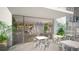Outdoor cafe with tables and chairs, and a juice bar at 2170 Robinhood Street # C1-312, Sarasota, FL 34231