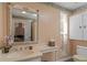 Charming bathroom with updated vanity and a window for natural light at 1713 North Dr, Sarasota, FL 34239