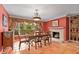 Spacious dining room features a fireplace and large window at 1713 North Dr, Sarasota, FL 34239