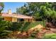 House exterior with lush landscaping and ivy at 1713 North Dr, Sarasota, FL 34239