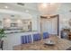 Spacious kitchen with granite countertops, white cabinets, and stainless steel appliances at 401 N Point Rd # 901, Osprey, FL 34229