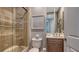 Small bathroom with a shower/tub combo and updated vanity at 401 N Point Rd # 901, Osprey, FL 34229
