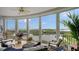 Spacious balcony with scenic waterfront view and seating at 401 N Point Rd # 901, Osprey, FL 34229
