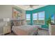 Bright bedroom with city views, featuring a comfortable bed and stylish decor at 401 N Point Rd # 901, Osprey, FL 34229