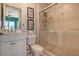 Clean bathroom with a shower and white vanity at 401 N Point Rd # 901, Osprey, FL 34229
