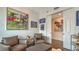 Relaxing sitting area with leather armchairs and large artwork at 401 N Point Rd # 901, Osprey, FL 34229