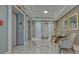 Lobby with marble floors and elevators at 401 N Point Rd # 901, Osprey, FL 34229
