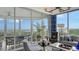 Living room with access to balcony and view at 401 N Point Rd # 901, Osprey, FL 34229
