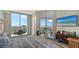 Main bedroom with water views and private balcony at 401 N Point Rd # 901, Osprey, FL 34229