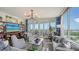 Spacious living room with water view at 401 N Point Rd # 901, Osprey, FL 34229