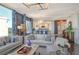 Spacious living room with ample natural light and city views at 401 N Point Rd # 901, Osprey, FL 34229