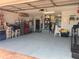 Attached garage with storage and exercise equipment at 912 62Nd Street W Ct, Bradenton, FL 34209