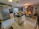 Open kitchen with island and view to dining area at 912 62Nd Street W Ct, Bradenton, FL 34209