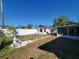 Large backyard with gazebo and a walkway leading to a patio area at 912 62Nd Street W Ct, Bradenton, FL 34209