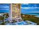 High-rise building with oceanfront pool and beach access at 5400 Ocean Blvd # 6-4, Sarasota, FL 34242