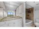 Updated bathroom with granite vanity and tiled shower/tub combo at 5400 Ocean Blvd # 6-4, Sarasota, FL 34242
