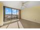 Bedroom with large windows and ocean view at 5400 Ocean Blvd # 6-4, Sarasota, FL 34242