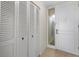 Bright entryway with built-in storage and tiled floors at 5400 Ocean Blvd # 6-4, Sarasota, FL 34242