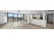 Open kitchen with granite counters and modern appliances at 5400 Ocean Blvd # 6-4, Sarasota, FL 34242