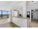 Kitchen features granite countertop and breakfast bar at 5400 Ocean Blvd # 6-4, Sarasota, FL 34242