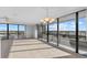 Bright living room with large windows offering panoramic city views at 5400 Ocean Blvd # 6-4, Sarasota, FL 34242