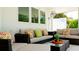 Relaxing patio with comfortable seating and colorful pillows at 676 Key Royale Drive, Holmes Beach, FL 34217
