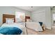 Twin bedroom with two beds, stylish decor and plenty of natural light at 676 Key Royale Drive, Holmes Beach, FL 34217