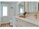 Elegant bathroom with double vanity, modern fixtures, and a spacious layout at 676 Key Royale Drive, Holmes Beach, FL 34217
