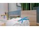 Close up of a bathroom vanity with rolled towels and decorative starfish at 676 Key Royale Drive, Holmes Beach, FL 34217
