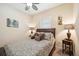 Charming bedroom with wood bed frame and window seating at 27855 Arrowhead Cir, Punta Gorda, FL 33982