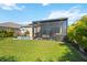 Backyard oasis with pool, lanai and lush landscaping at 27855 Arrowhead Cir, Punta Gorda, FL 33982