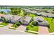 Aerial view of houses with a pond nearby at 27855 Arrowhead Cir, Punta Gorda, FL 33982