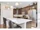 Modern kitchen with stainless steel appliances and island at 27855 Arrowhead Cir, Punta Gorda, FL 33982