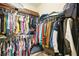 Large walk-in closet with ample shelving and hanging space for clothes at 27855 Arrowhead Cir, Punta Gorda, FL 33982