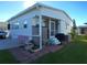 Mobile home with patio and grill at 3333 26Th E Ave # 1064, Bradenton, FL 34208