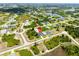 Wide shot showing home's location within a residential community at 214 Lime Tree Park, Rotonda West, FL 33947