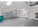 Spacious two-car garage with epoxy floor and ample storage at 214 Lime Tree Park, Rotonda West, FL 33947