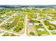 House in a quiet neighborhood with lush green surroundings at 214 Lime Tree Park, Rotonda West, FL 33947
