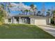 Image 1 of 73: 128 Miracle St, Port Charlotte