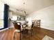 Dining room with open layout, chandelier lighting, and access to kitchen at 611 Riviera Dunes Way # 308, Palmetto, FL 34221
