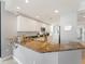 Open concept kitchen with stainless steel appliances and updated countertops at 611 Riviera Dunes Way # 308, Palmetto, FL 34221