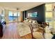 Large living room with access to outdoor living, dining room, and water views at 611 Riviera Dunes Way # 308, Palmetto, FL 34221