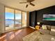 Relaxing living room with hard wood floors and water view access at 611 Riviera Dunes Way # 308, Palmetto, FL 34221