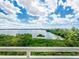 Enjoy the beautiful views of the water and natural Florida landscape at 611 Riviera Dunes Way # 308, Palmetto, FL 34221