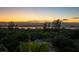 Wide view of the bay, showing an expanse of lush greenery during golden hour at 611 Riviera Dunes Way # 308, Palmetto, FL 34221