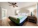 Bright bedroom with ceiling fan and ensuite bathroom at 858 Hudson Ave # 858, Sarasota, FL 34236