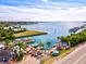 Stunning aerial view showcasing waterfront property and marina at 2590 N Beach Rd # 3, Englewood, FL 34223