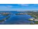 Expansive aerial view capturing the stunning coastline, waterways, and city skyline at 1136 N Lake Shore Dr, Sarasota, FL 34231